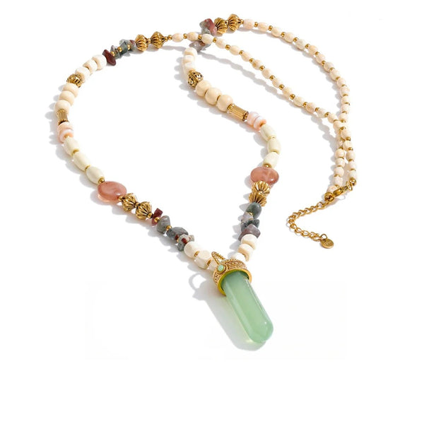 Gold-plated stainless steel necklace with natural stone and resin, featuring a large green stone pendant.
