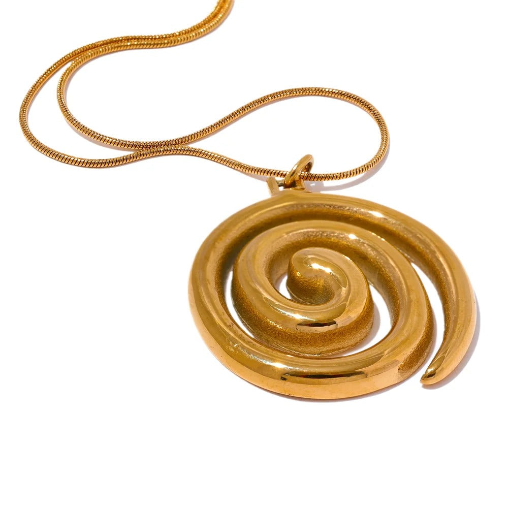 Gold-plated stainless steel necklace with a large circular pendant featuring concentric circles.