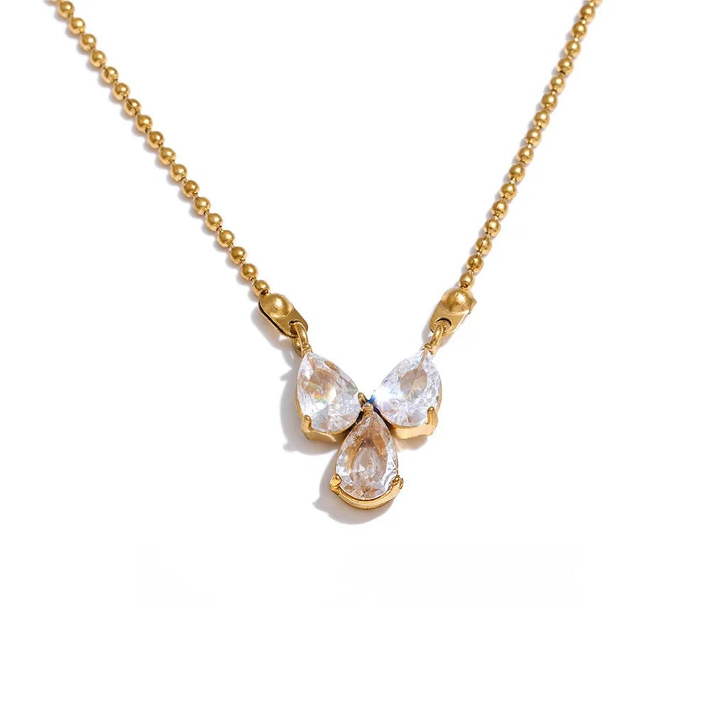 Gold-plated stainless steel necklace with cubic zirconia accents.