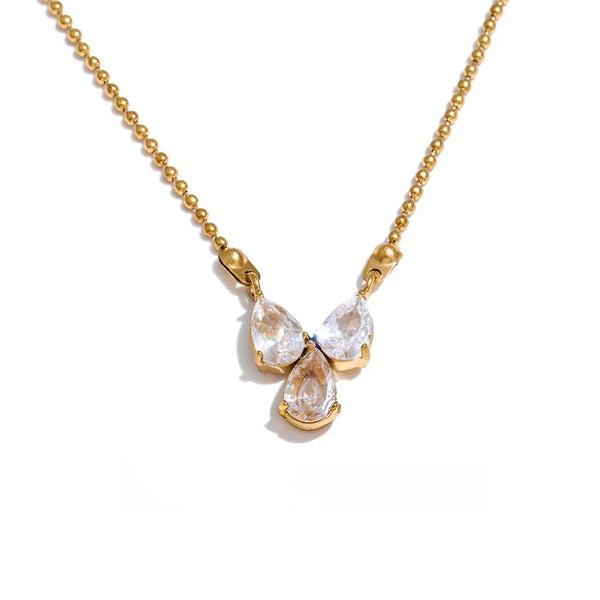 Gold-plated stainless steel necklace with cubic zirconia accents.