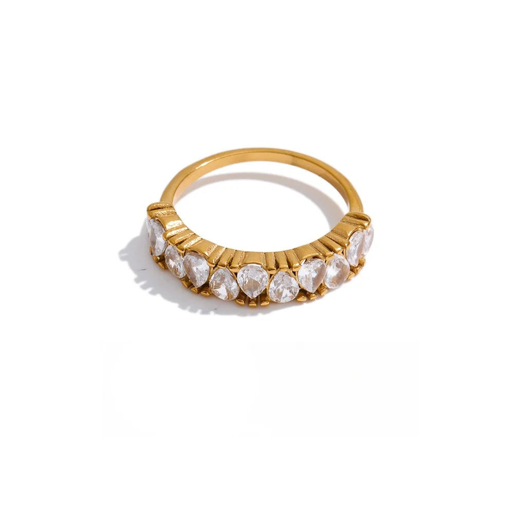 Ring made of gold-plated stainless steel with cubic zirconia.