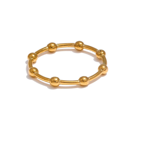 Gold-plated ring with multiple spheres.