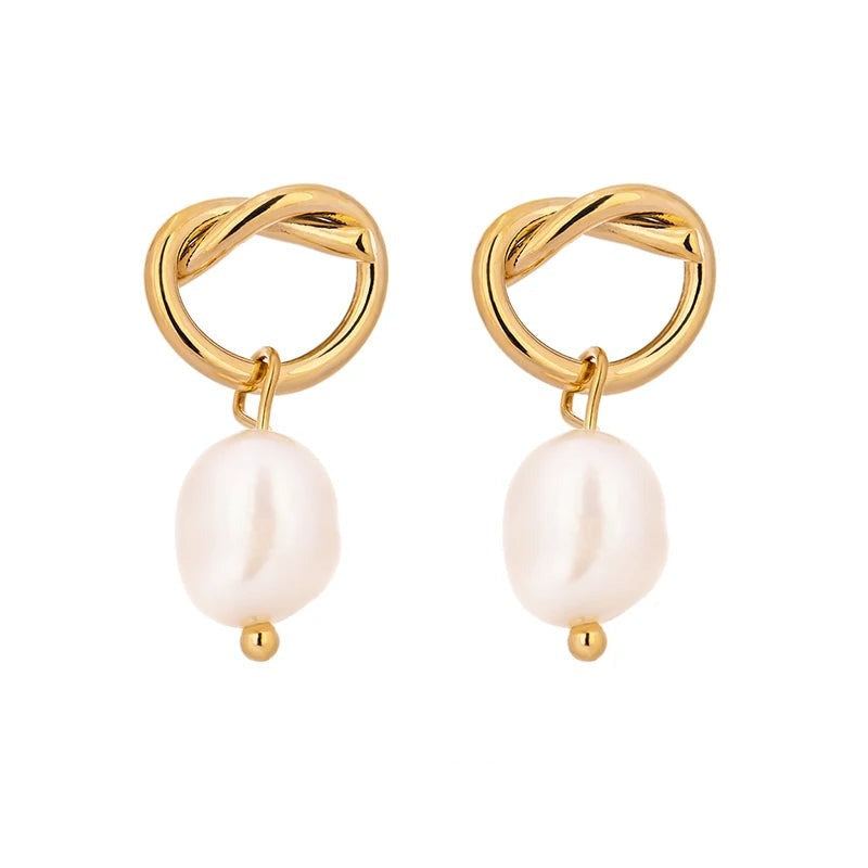 Copper earrings with freshwater pearls.