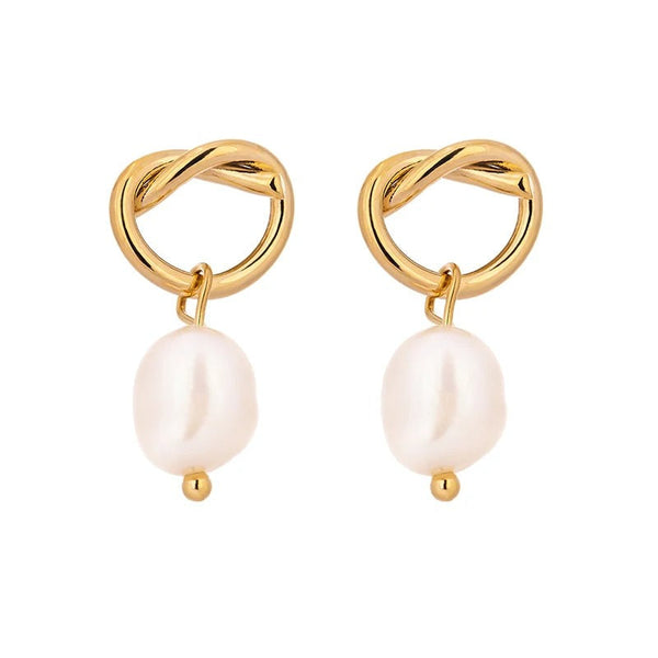 Copper earrings with freshwater pearls.