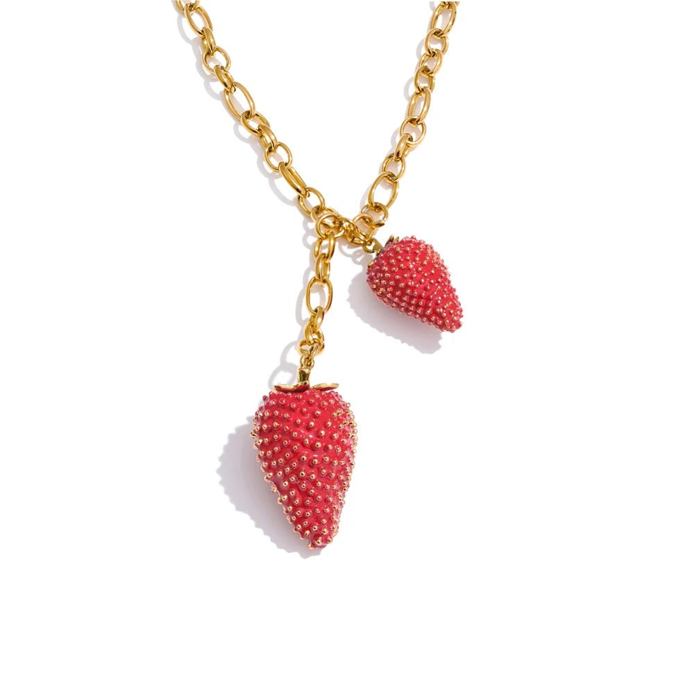 Gold-plated stainless steel necklace with red gemstone pendants.