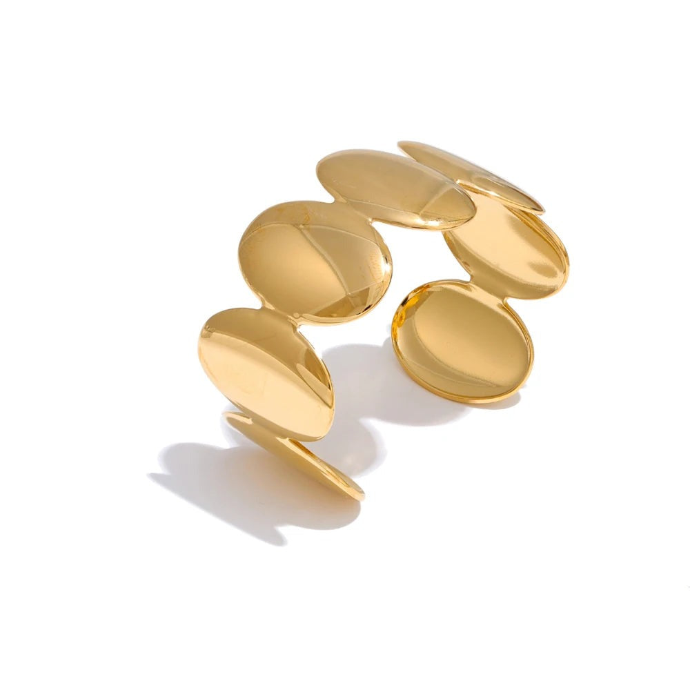 Gold-plated stainless steel bracelet with a cluster of oval beads.