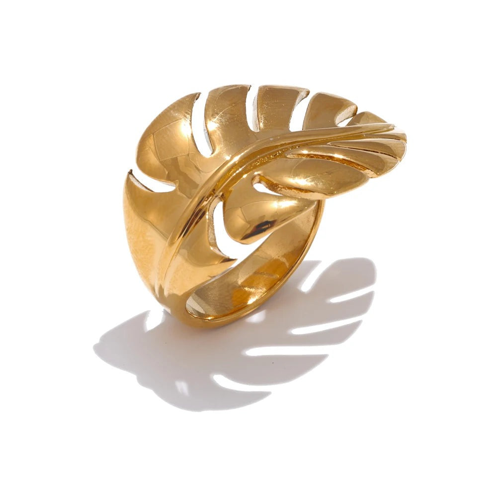 Gold-plated stainless steel ring with a large leaf design.