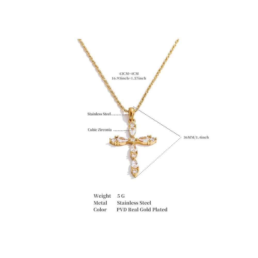 Cubic zirconia cross necklace in gold-plated stainless steel with cubic zirconia.