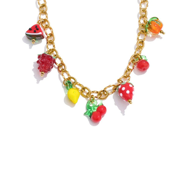 Gold-plated necklace with colorful fruit charms.