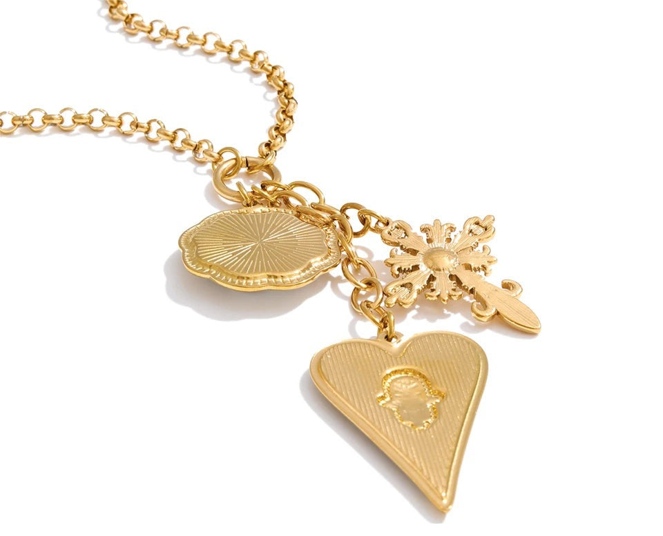 Heart cross necklace in gold-plated stainless steel.