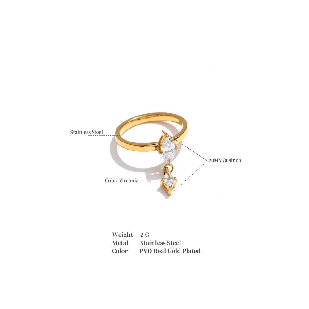 Cubic zirconia geometric ring in 18K gold-plated stainless steel with cubic zirconia.