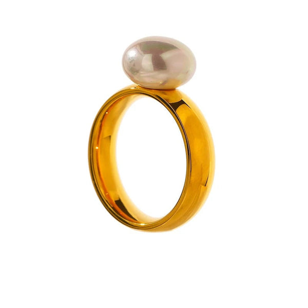 Gold-plated stainless steel ring with pearl and shell.