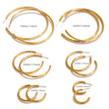 Minimalist geometric earrings in gold-plated stainless steel.