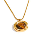 Natural stone geometric necklace in gold-plated stainless steel with natural stone.