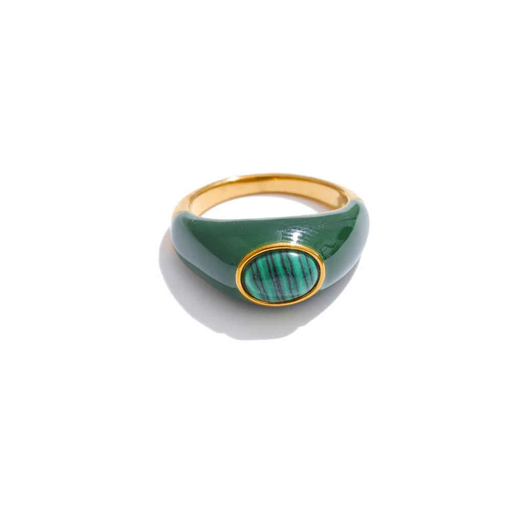 Gold-plated stainless steel ring with blue stone and shell.