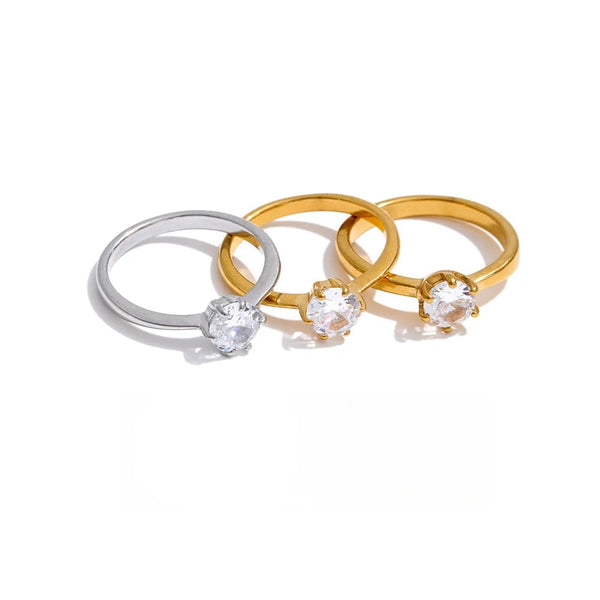 Gold-plated stainless steel ring with cubic zirconia stones.