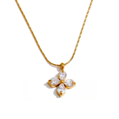 Gold-plated stainless steel necklace with cubic zirconia flower pendant.