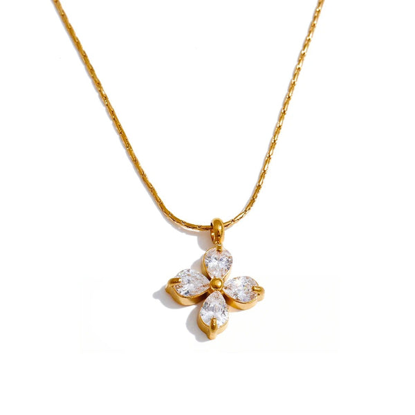 Gold-plated stainless steel necklace with cubic zirconia flower pendant.
