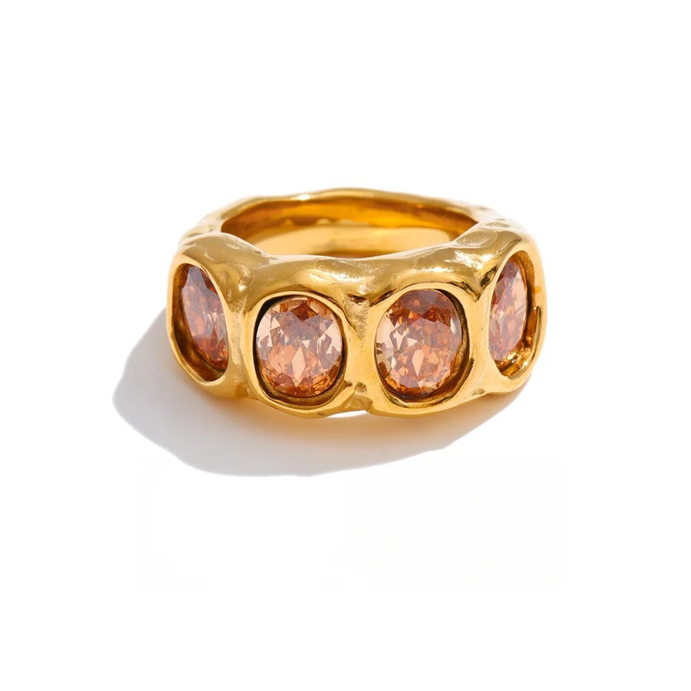 Gold-plated ring with cubic zirconia stones.