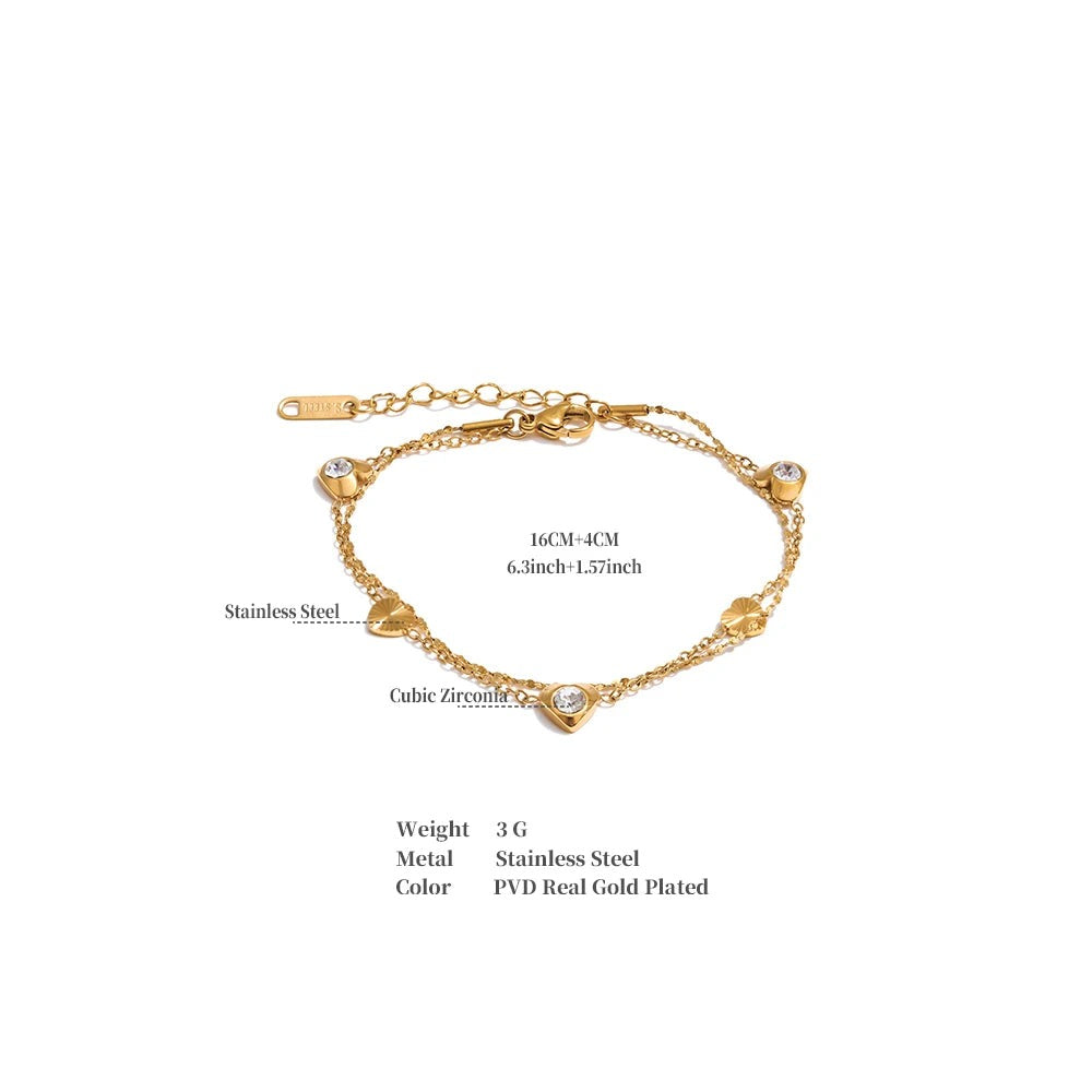 Cubic zirconia heart chain necklace in gold-plated stainless steel with cubic zirconia.