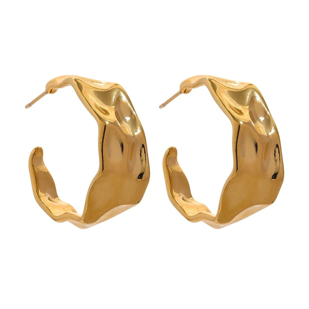 Gold-plated 316l stainless steel earrings with a unique design.