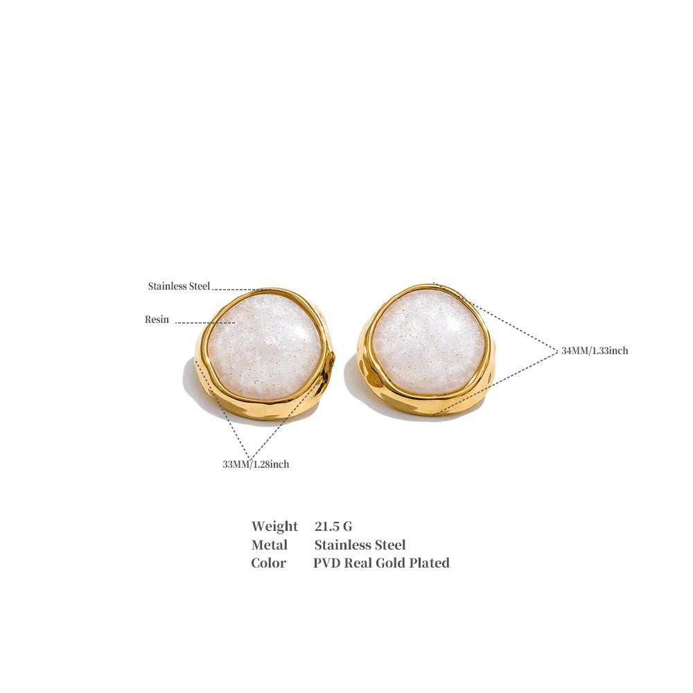 White resin acrylic earrings in gold-plated stainless steel with resin and acrylic.