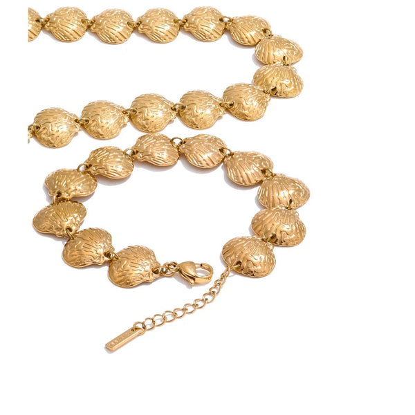 Gold-plated stainless steel necklace with shells.