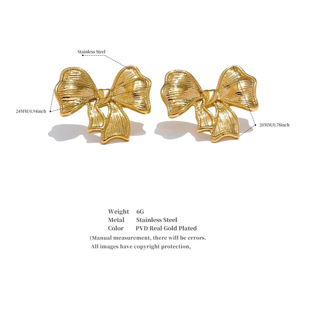 Bow earrings in gold-plated stainless steel.
