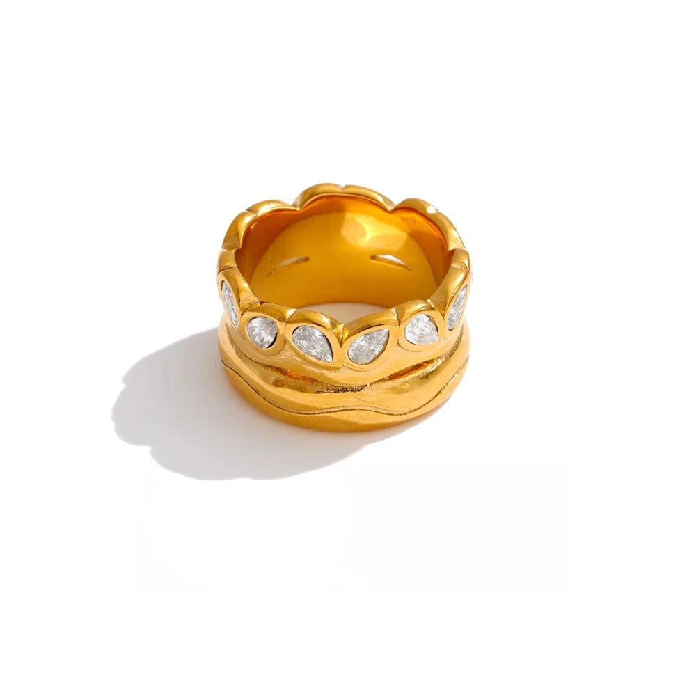 Gold-plated stainless steel ring with cubic zirconia accents.