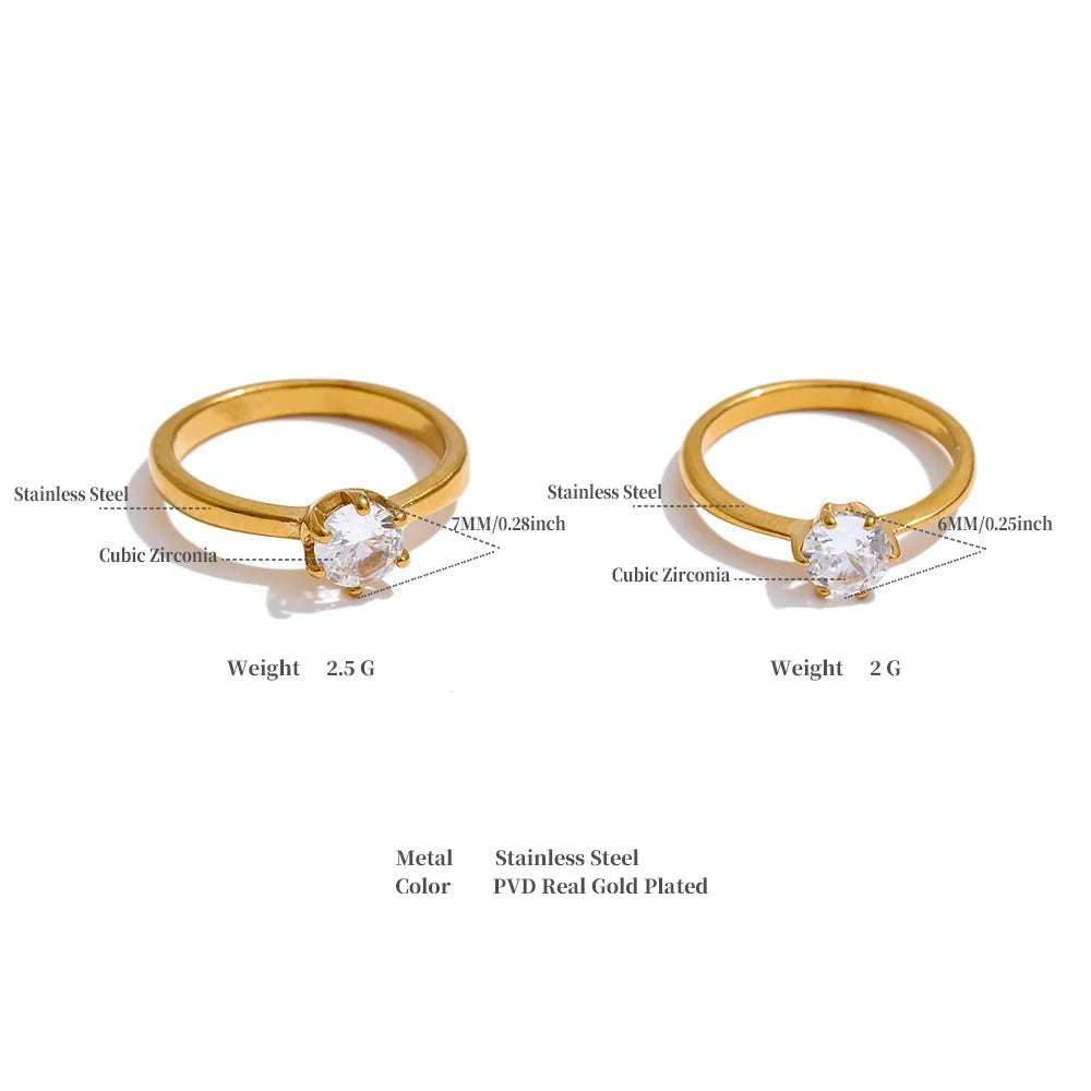 Cubic zirconia geometric ring in 18K gold-plated stainless steel with cubic zirconia.