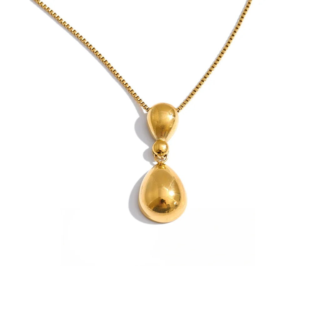 Gold-plated stainless steel necklace with a large teardrop pendant.