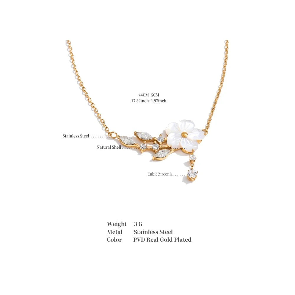 Cubic zirconia shell flower necklace in gold-plated stainless steel with cubic zirconia and shell.