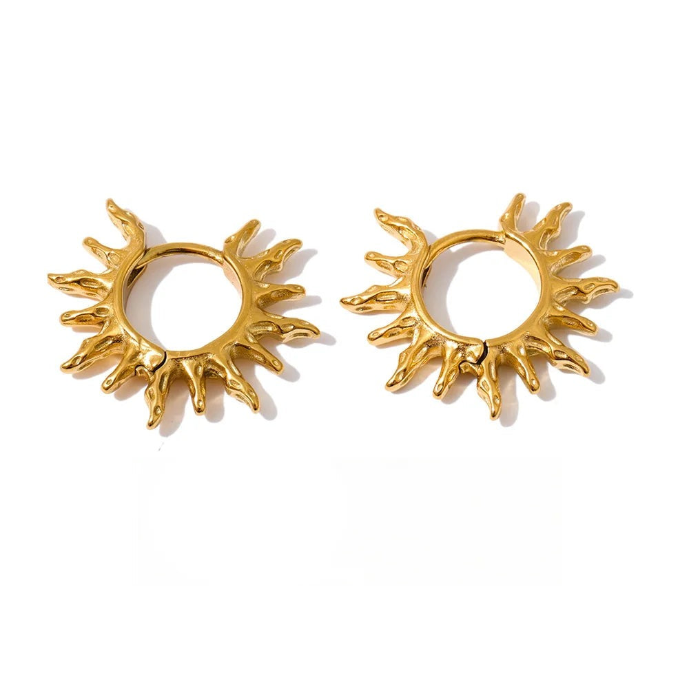 Gold-plated stainless steel earrings featuring sun motif.