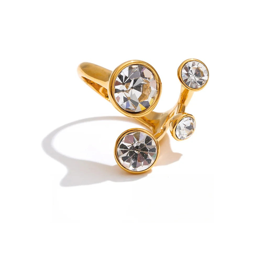 Gold-plated stainless steel ring with multiple crystals.
