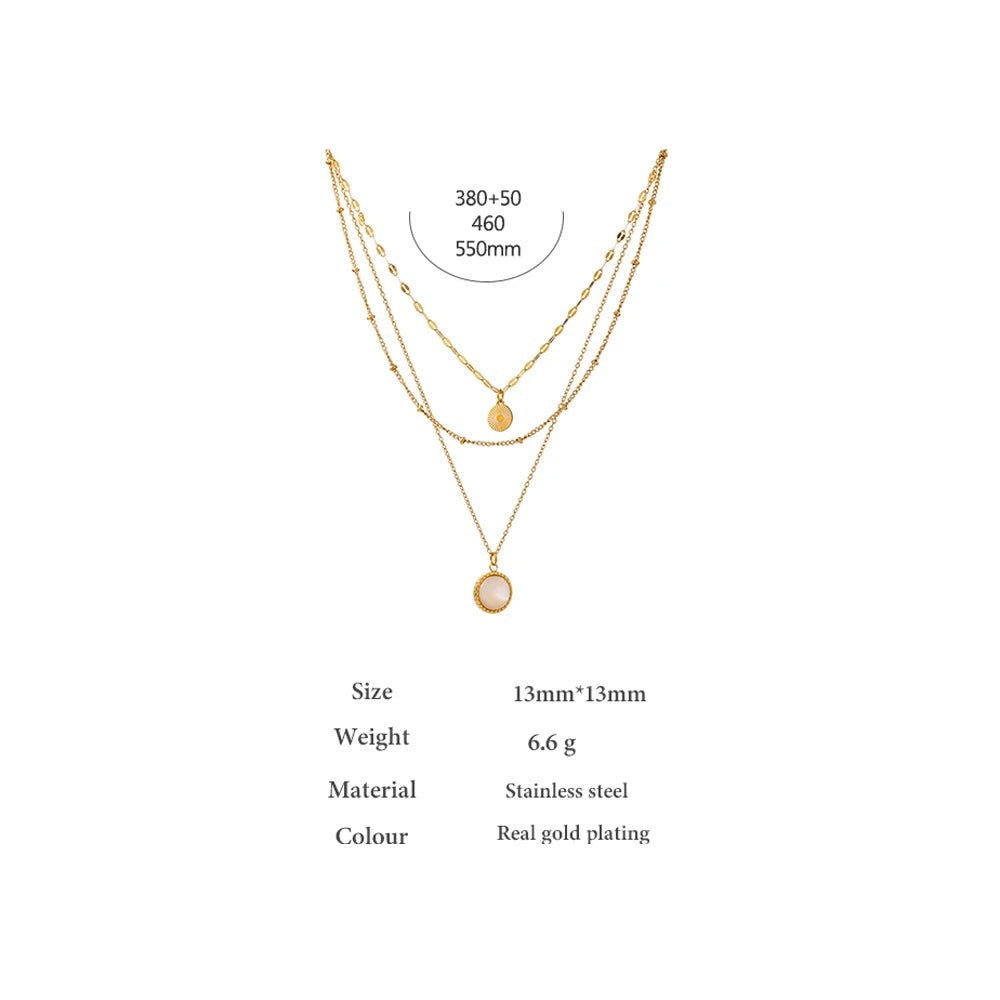 Coin hammered boho necklace in gold-plated stainless steel.