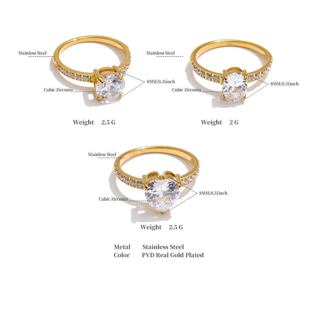 Cubic zirconia heart ring in gold-plated stainless steel with cubic zirconia.