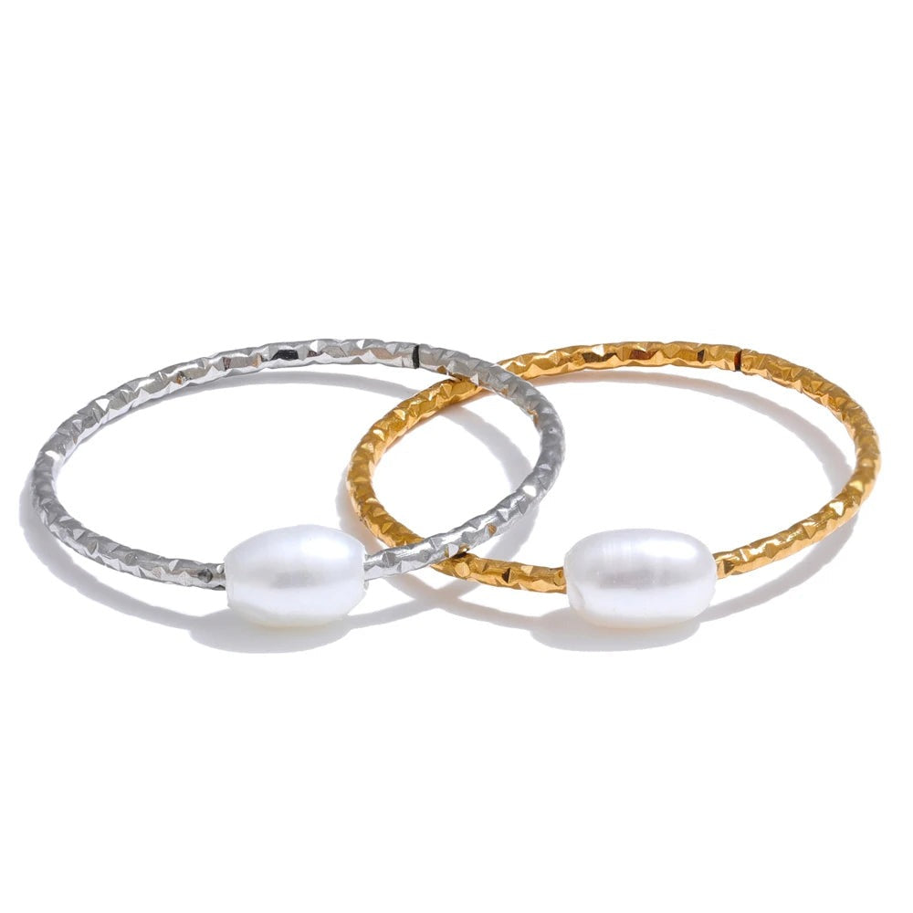 Gold-plated stainless steel rings with freshwater pearls.
