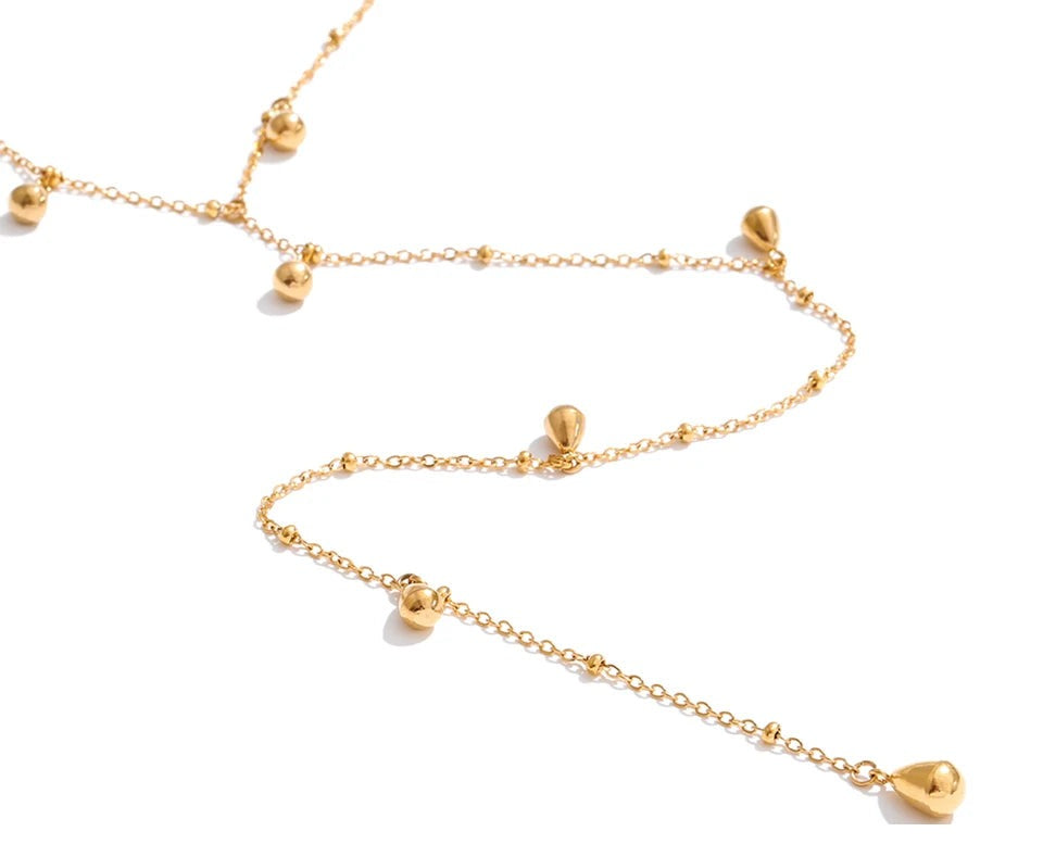 Geometric chain necklace in gold-plated stainless steel.