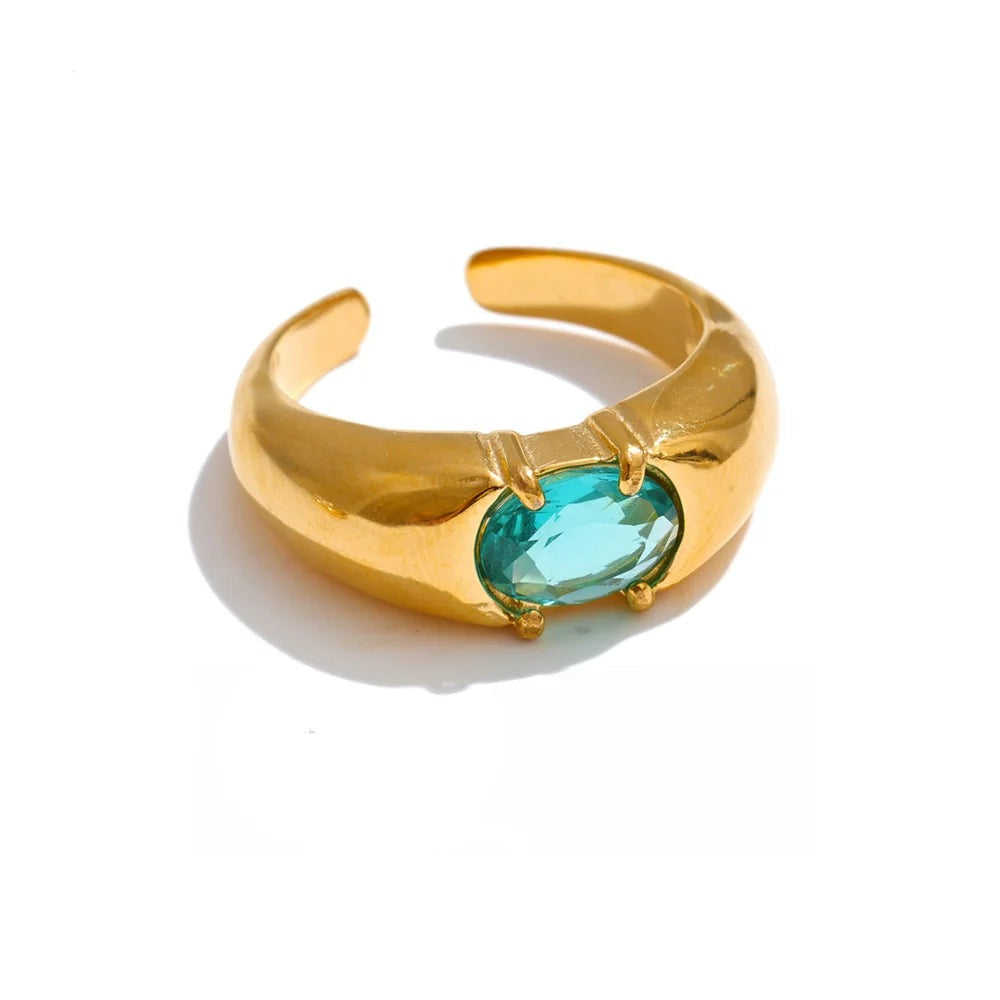 Gold-plated ring with blue stone.