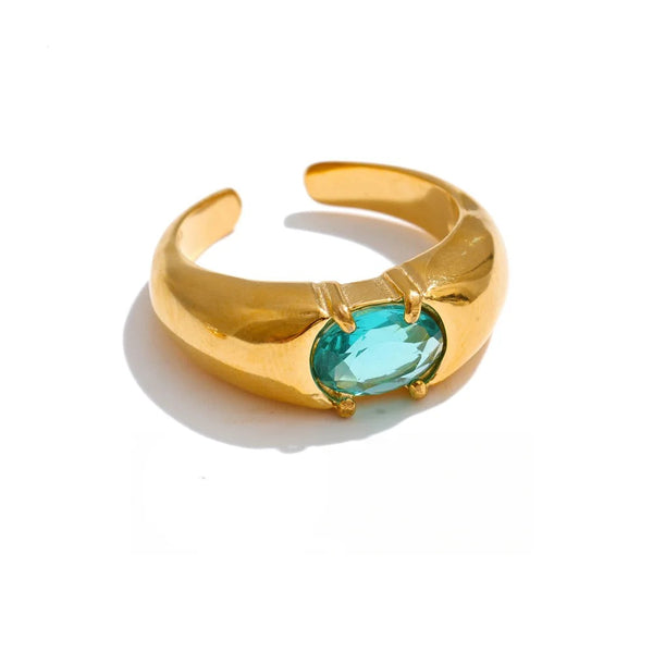 Gold-plated ring with blue stone.