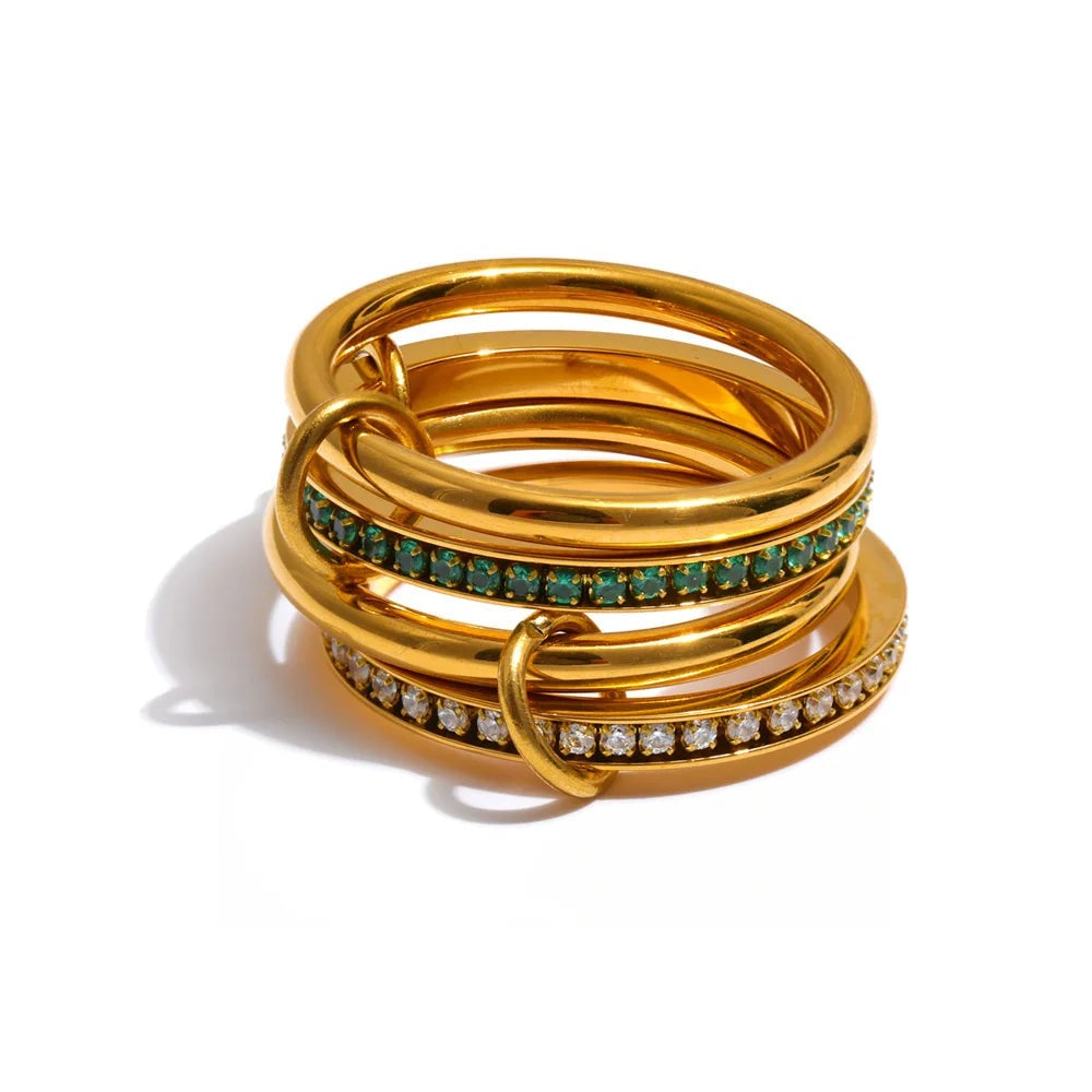 Gold-plated stainless steel ring with cubic zirconia stones.
