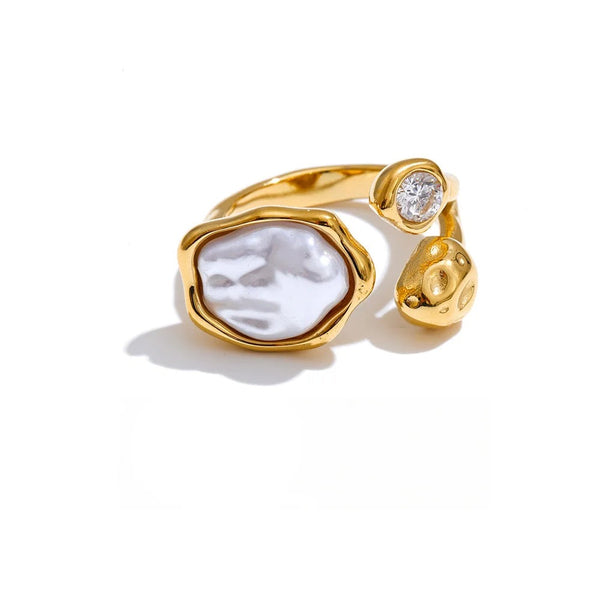 Gold-plated stainless steel ring with pearl and cubic zirconia.