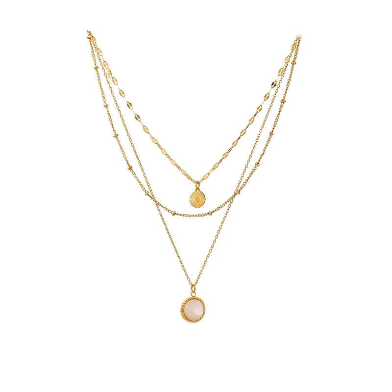 Gold-plated stainless steel necklace with multiple pendant stones.
