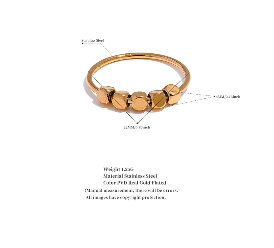 Beaded geometric ring in 18K gold-plated stainless steel.