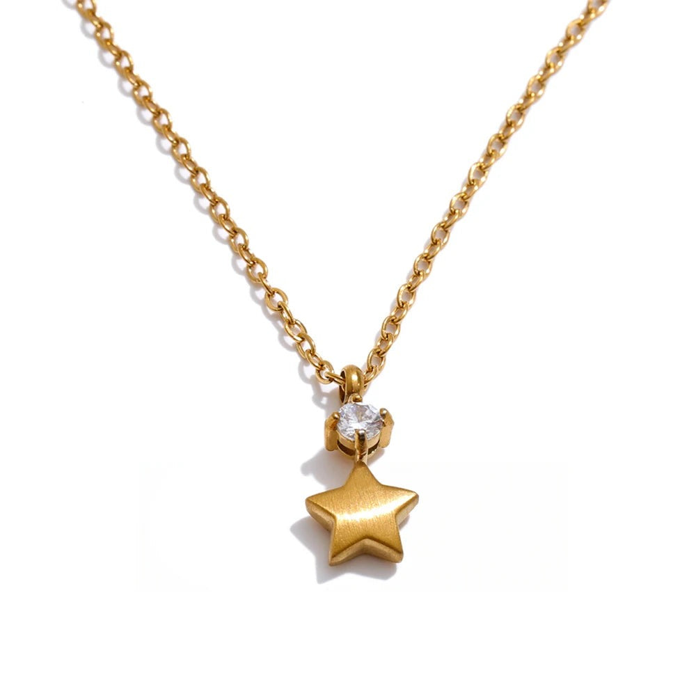 Gold-plated stainless steel necklace with cubic zirconia star pendant.