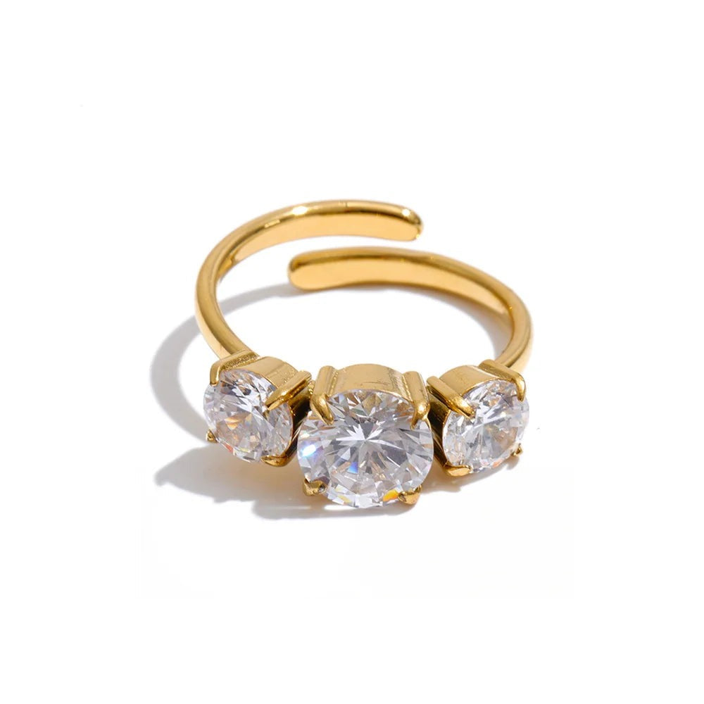 Gold-plated ring with cubic zirconia stones.