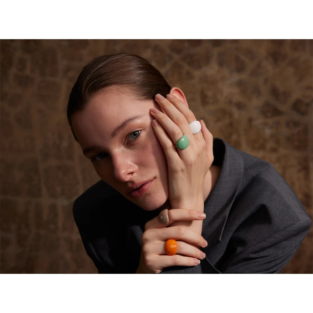 White enamel multi-color ring in 18K gold-plated stainless steel with enamel.