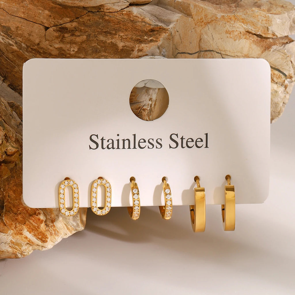 White CZ Stud Earrings — Stainless Steel · PS378