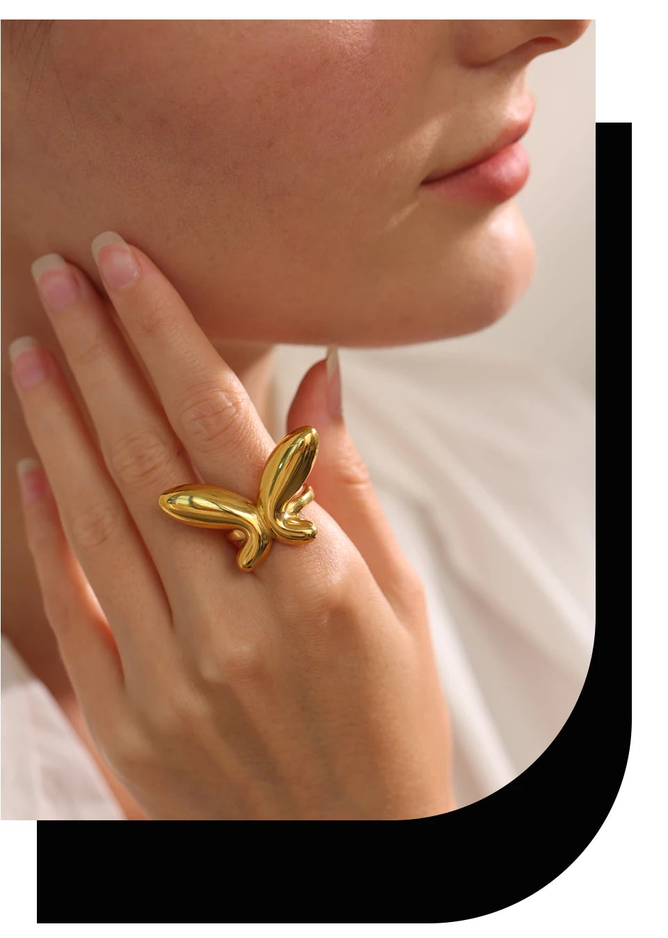 Butterfly minimalist geometric ring in 18K gold-plated 316L stainless steel.