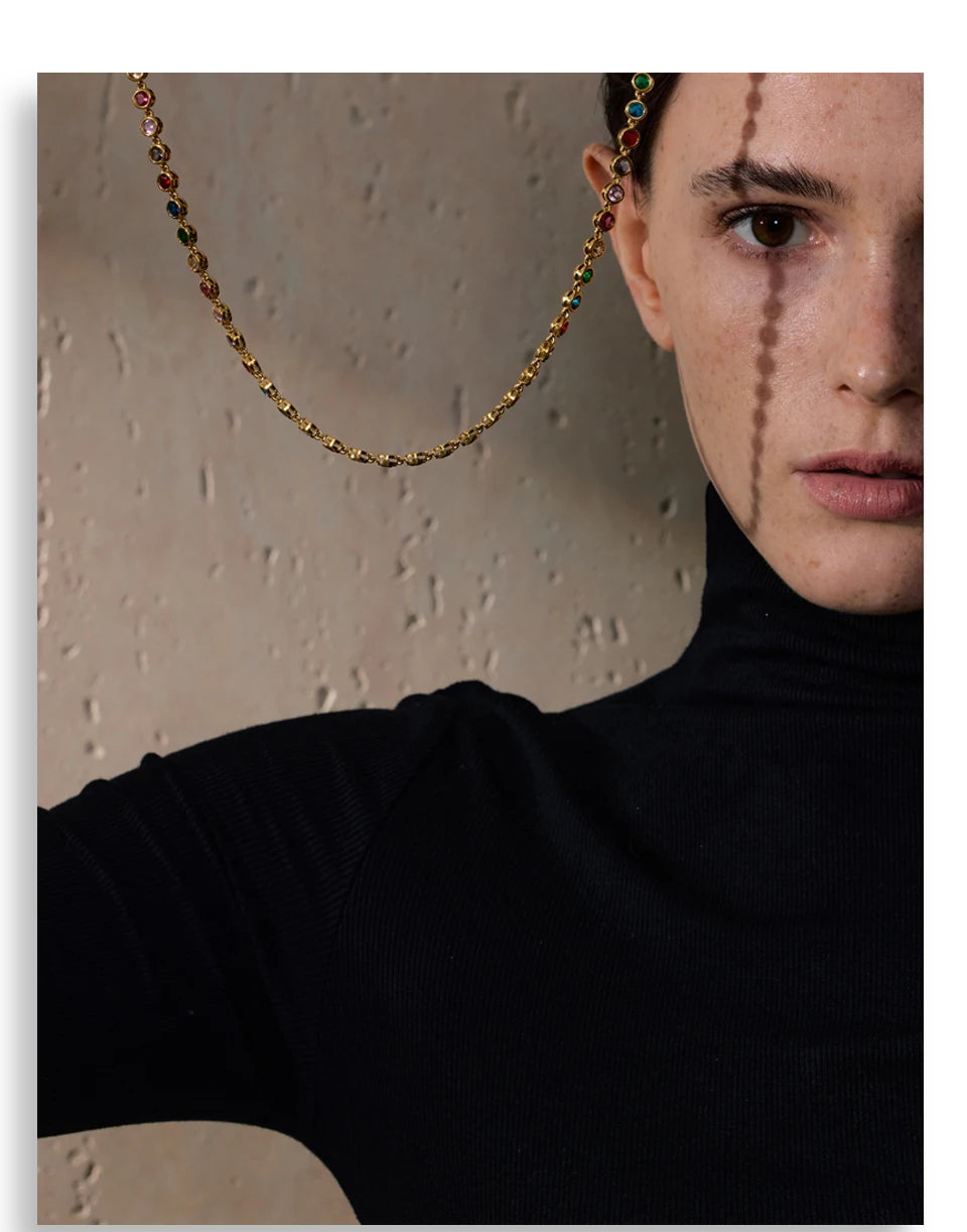 Cubic zirconia multi-color geometric necklace in gold-plated stainless steel with cubic zirconia.